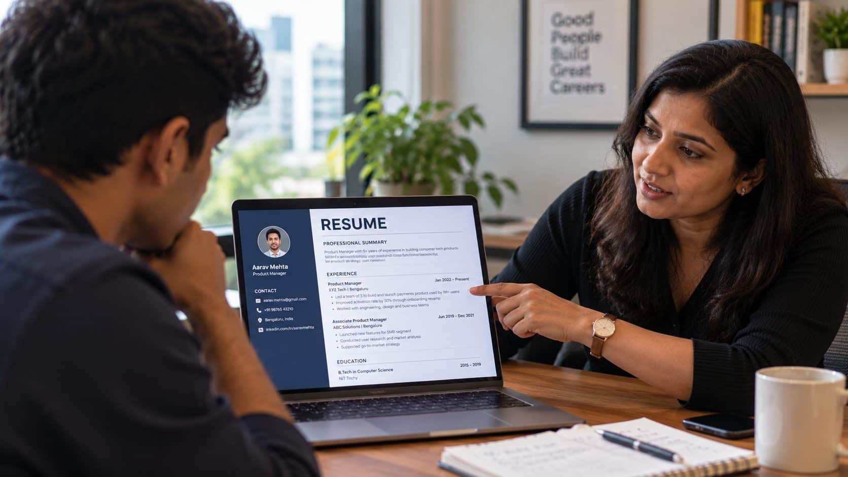 A career advisor reviewing a candidate's resume line by line with them